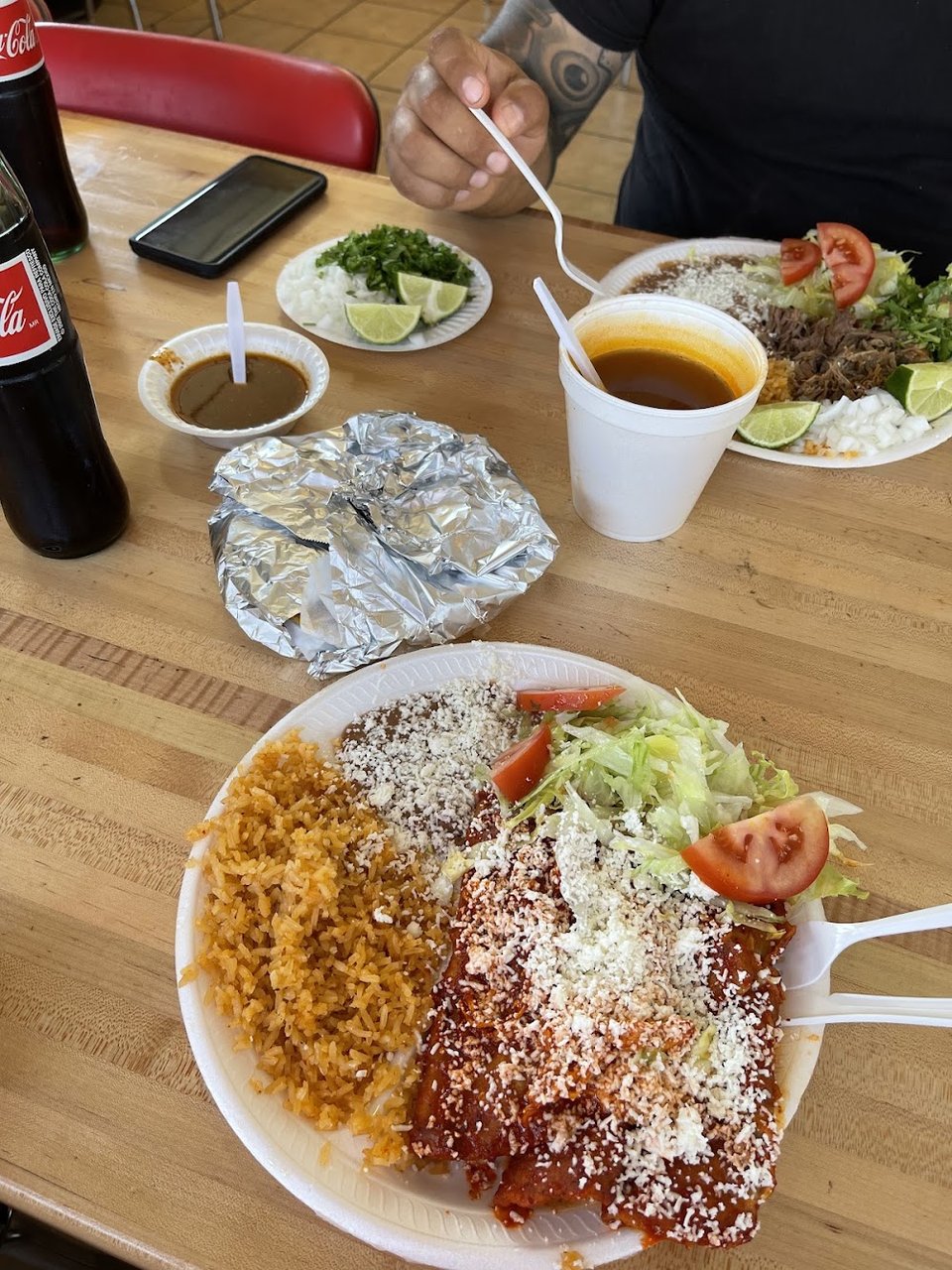Breakfast menu page with chilaquiles and huevos.